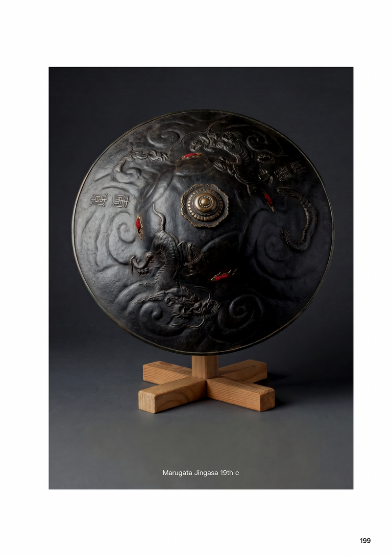 Nineteenth-century marugata jingasa with raised dragon decoration and a central gilt fitting